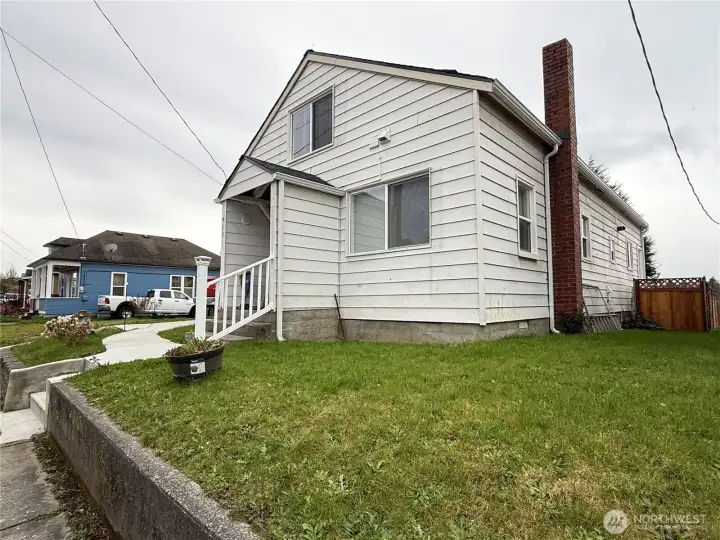 Side view with fenced backyard