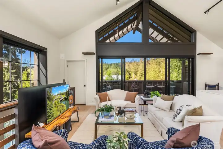 The living room has space for tv and the elevator opens just next to the balcony