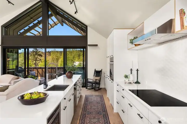 Easy space for culinary creations with energy efficient induction range.