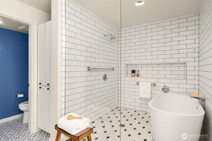 The massive walk-in shower and soaking tub feel like you have escaped to your own private spa