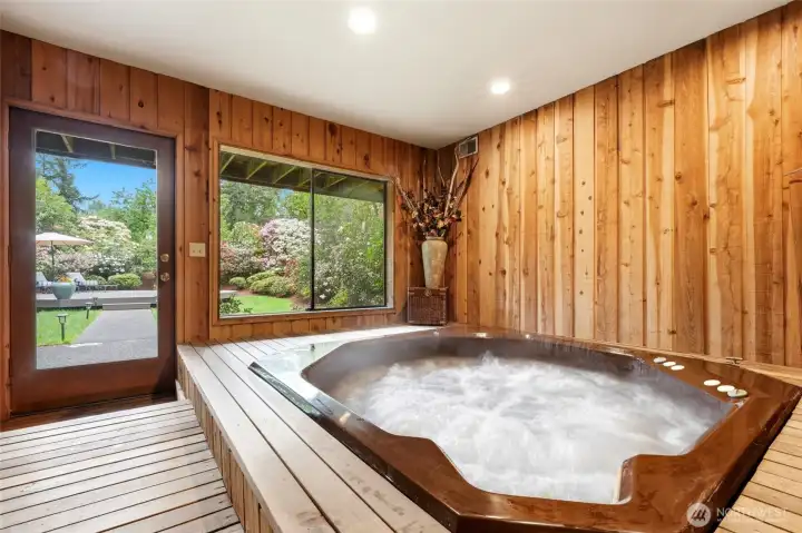 Spa room! Enjoy views of the garden in the indoor, cedar lined, dehumidified, hot tub room.