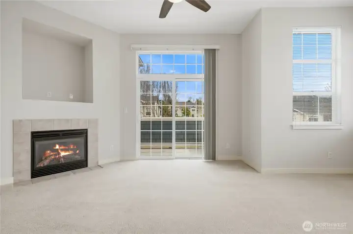 Cozy fireplace and lots of natural light.