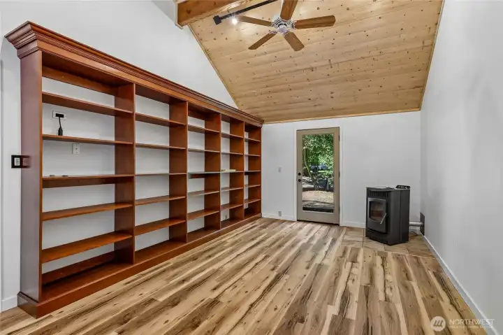 Office with inside and outside entrances. Clad with Voluminous ceilings and stunning Cherry Built in Bookcases.