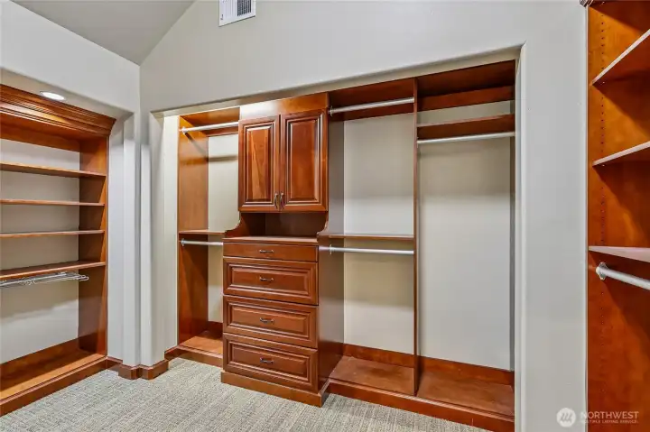 Cherry wood Primary Suite walk in closet