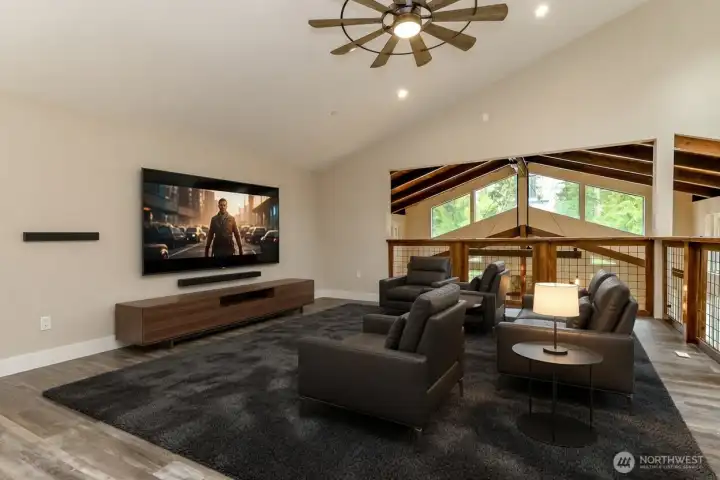 Spacious loft offers room for home theater, workout space, music practice, hobbies, and more