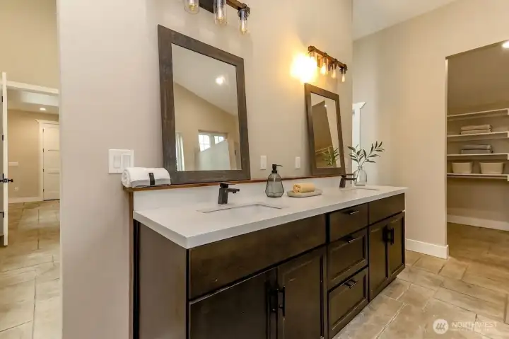 Primary suite bath with double vanities