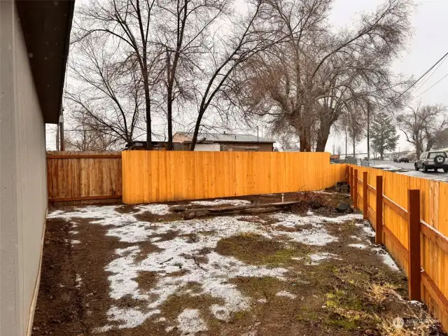 Large side yard next to garage