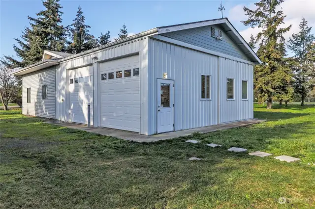 Detached garage with shop, 200 AMP panel, lots of room for cars and hobbies.