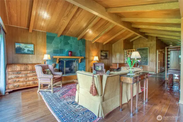 A bluestone fireplace surround brings beautiful color to the living room.