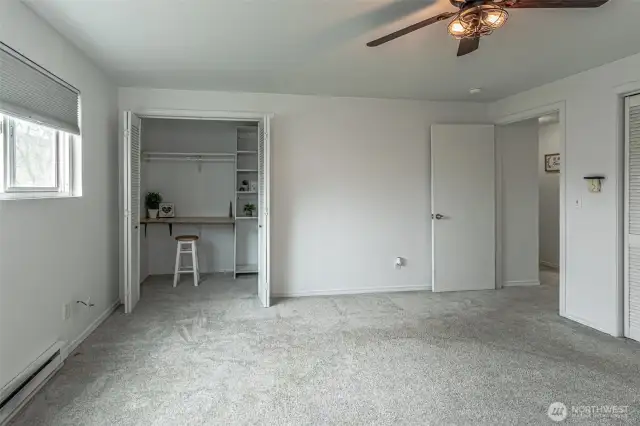 Large bedroom has 2 closets - one has been used as office space.