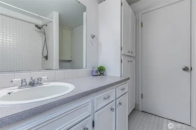 Tons of storage space in the full bathroom too.