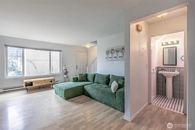 The half bath is remodeled and super cute with plenty of storage!