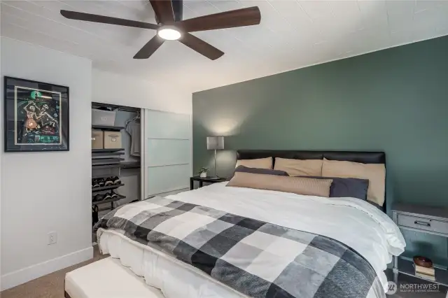 Primary bedroom with ceiling fan