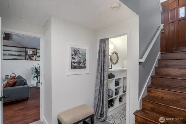 Downstairs wine closet under staircase