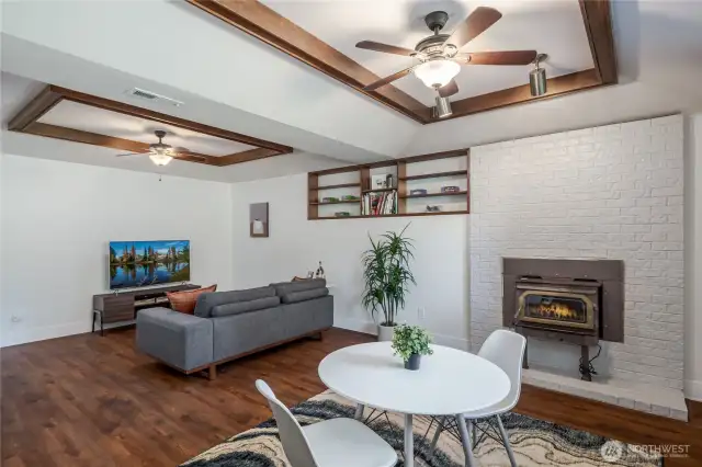 Basement bonus room with wood coffered ceiling & skylights