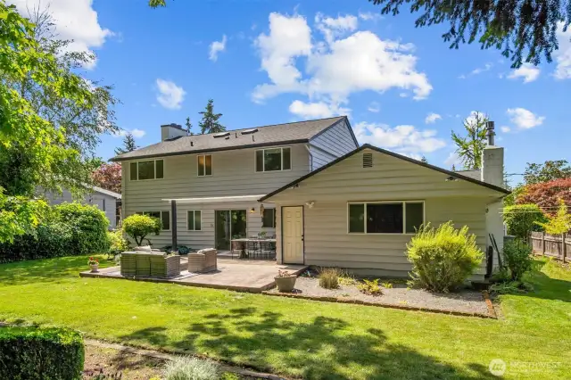 Beautiful fenced yard with expansive patio