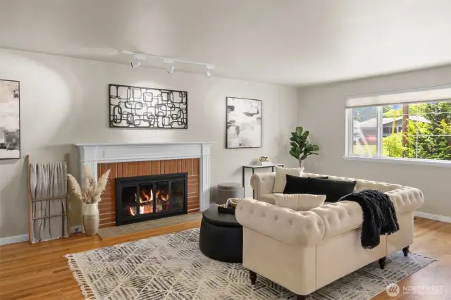 Light filled living room with inviting gas fire