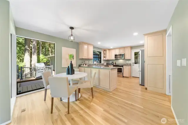 Bright and functional, the kitchen features a spacious eat-in nook and a picture-perfect view—just a few steps from the spacious deck.