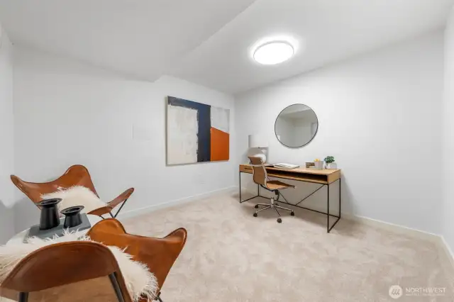 This peaceful space offers the perfect setting for a home office, studio, or study—elevated by plush new carpet, sleek modern finishes.