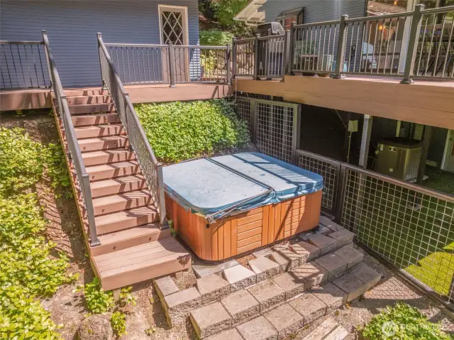 Indulge in ultimate relaxation with your own Hot Spring hot tub—nestled beneath the deck for added privacy and effortless access.