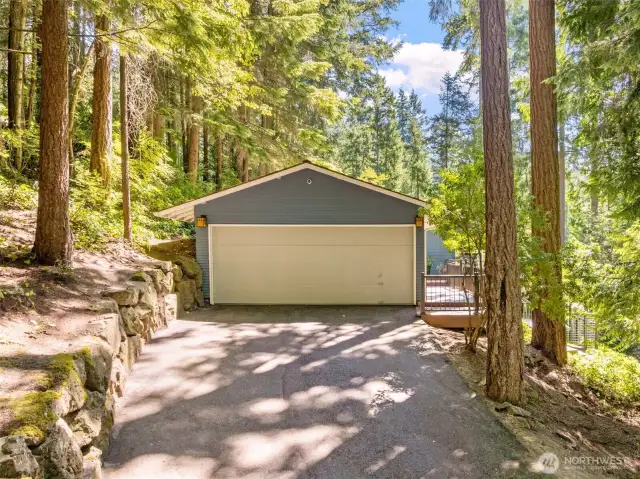 Conveniently located at the front of the property, the detached 1-car garage provides additional parking, storage, or workshop potential.
