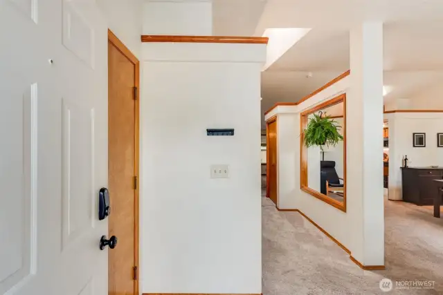Step inside to a flowing, open floorplan with large windows, vaulted ceilings & skylights that give the home tons of natural light.