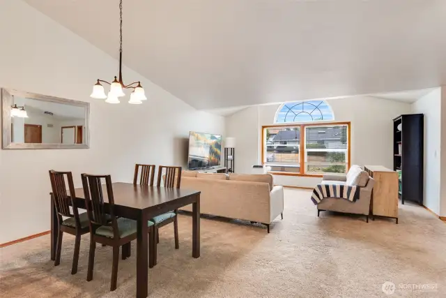 Dining area opens seamlessly to the living room & kitchen, ideal for everyday meals or gatherings.