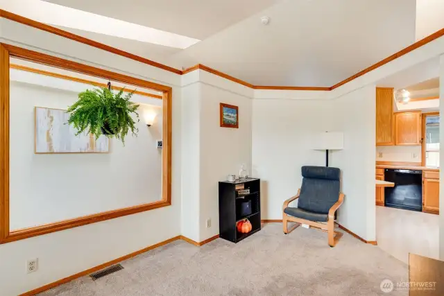 Versatile bonus room with skylight—great for a home office, reading nook, or play space.