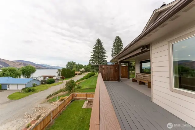 Front deck - off of living room. Horseshoe pit, yard area and outdoor shower/rinsing station below.