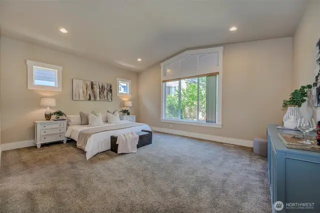 Primary Bedroom with vaulted ceilings