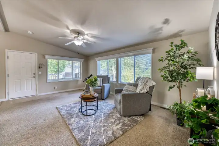 Spacious open living area with large windows for natural light!