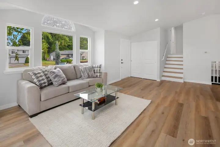 Open concept living room with fireplace