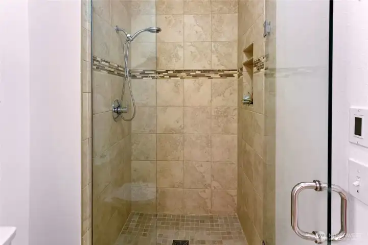 Primary bath has been updated with spacious shower
