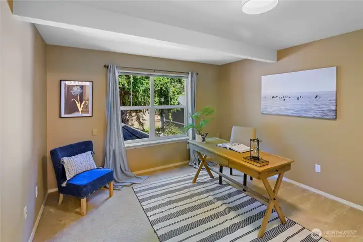 Bedroom 3 of 3 on upper level, shown as an office