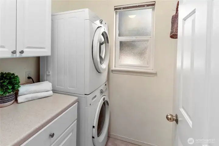 Laundry room is on main level, next to powder room