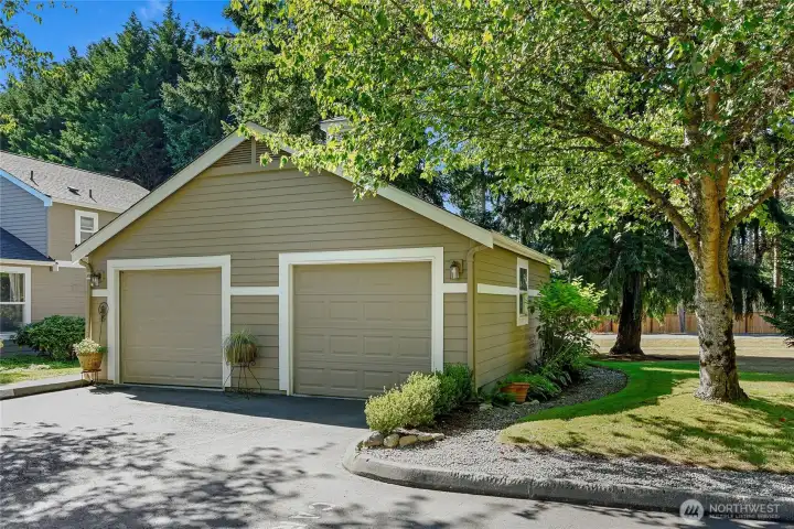 Separate garage. A8's garage is on the right. Person door is on the backside