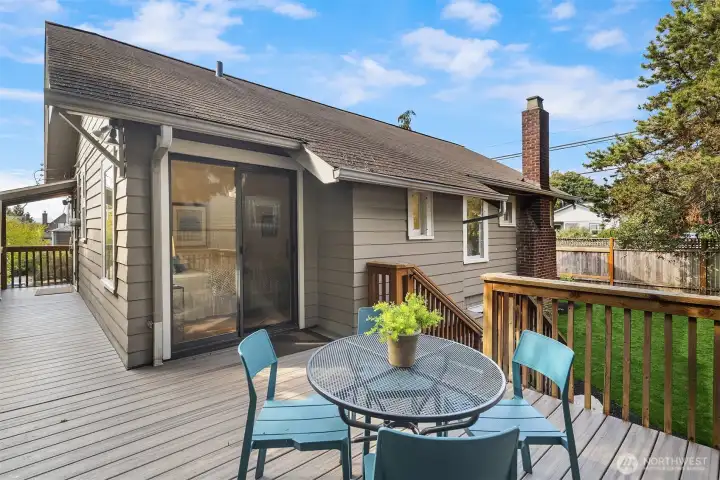 Deck with access from the kitchen and primary bedroom.