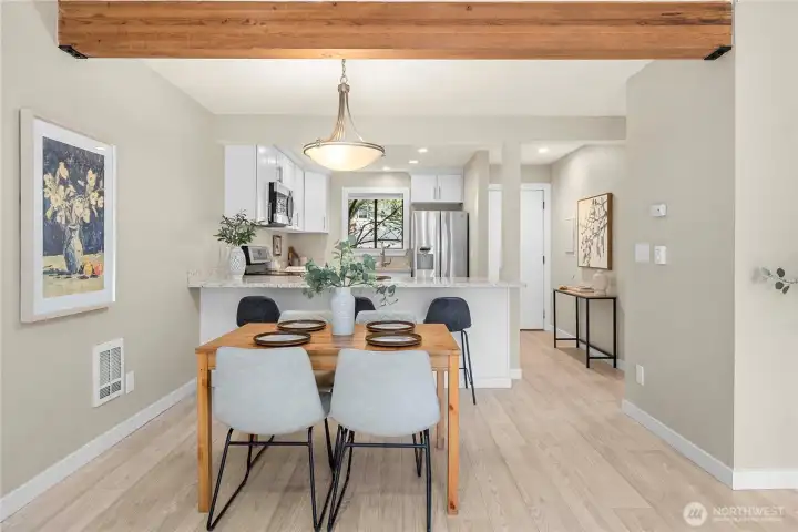 Exposed wood beam in ceiling offers a rustic and inviting feeling.