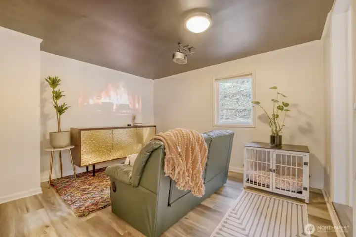 Extra finished room currently used as theater room.