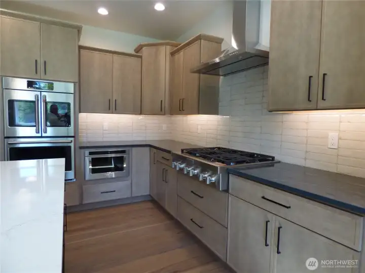 Photos are of the same plan previously built by the builder.  Changes to the finishes have been made.  Check with the listing broker for updated finishes.