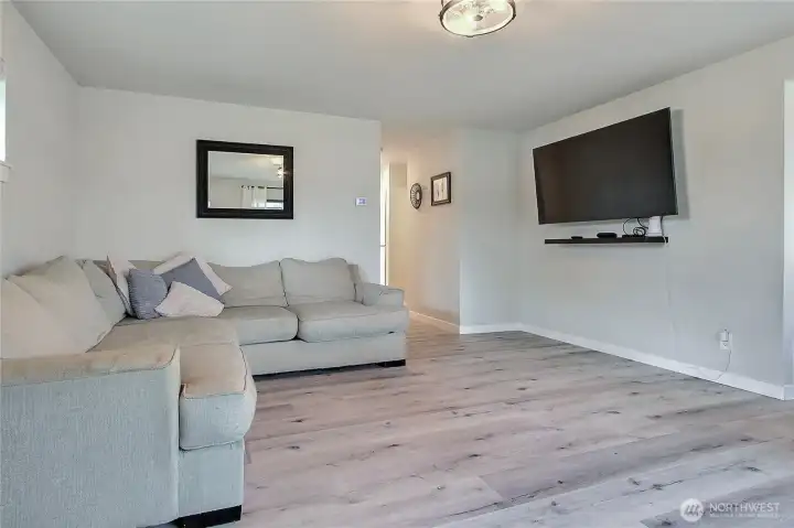 Spacious living room with open layout—ideal for entertaining and gathering.