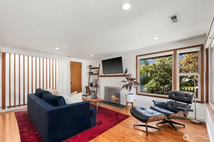 Custom design elements, wood slat wall that lets in light from skylight