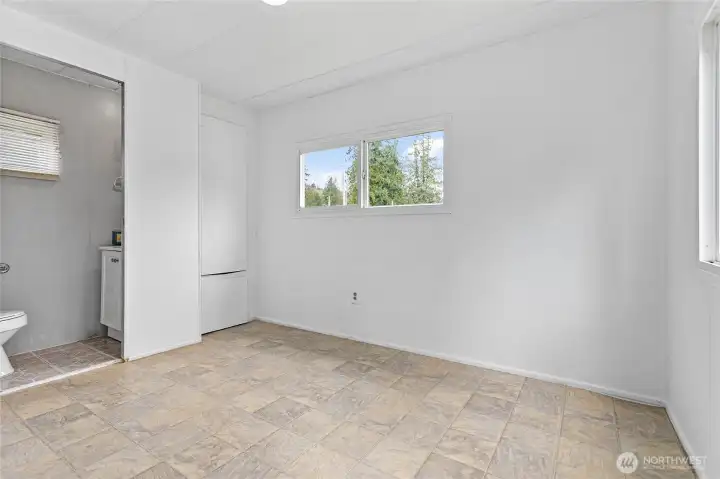 Primary bedroom with attached bathroom.