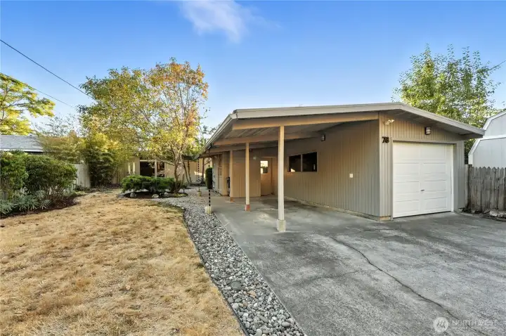 1 car garage with carport.