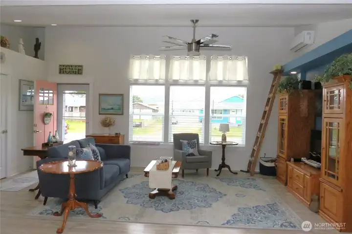 The sunny great room has easy-care engineered flooring through out the home!