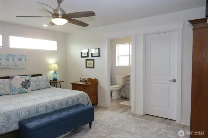 Primary bedroom has a large walk-in closet (behind the closed doorway) and attached ensuite bath!