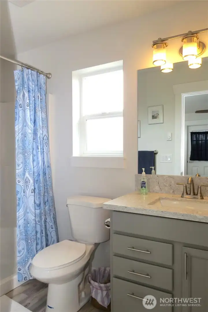 The ensuite bathroom has a large step-in shower!