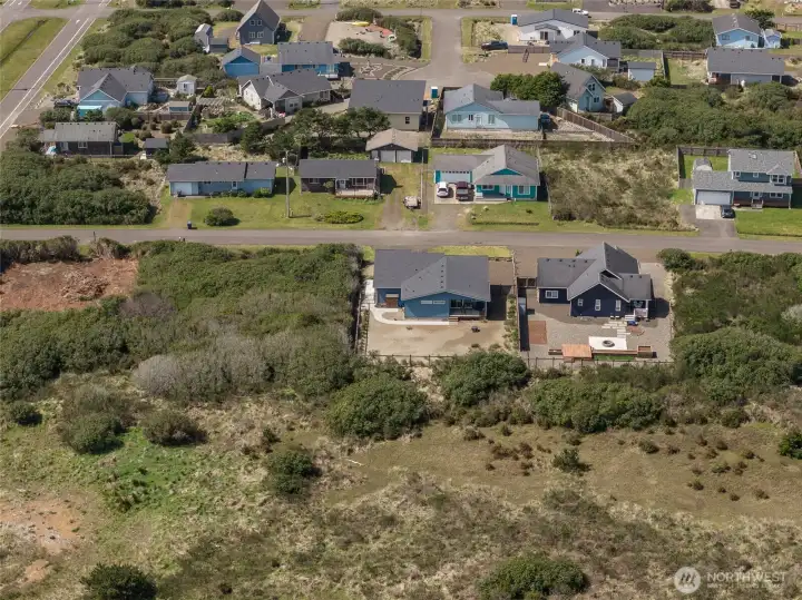 Aerial view showing the home backs up to a buffer zone of natural vegitation!