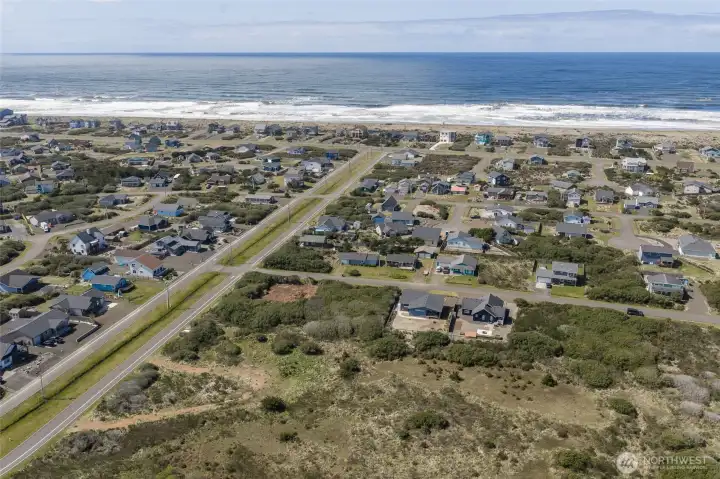 Aireal view of  the home showing the quick .03 of a mile walk to the beach!