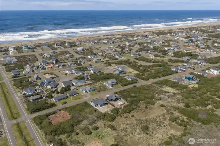 Aerial view to the north along the Pacific Ocean and beaches you can explore!